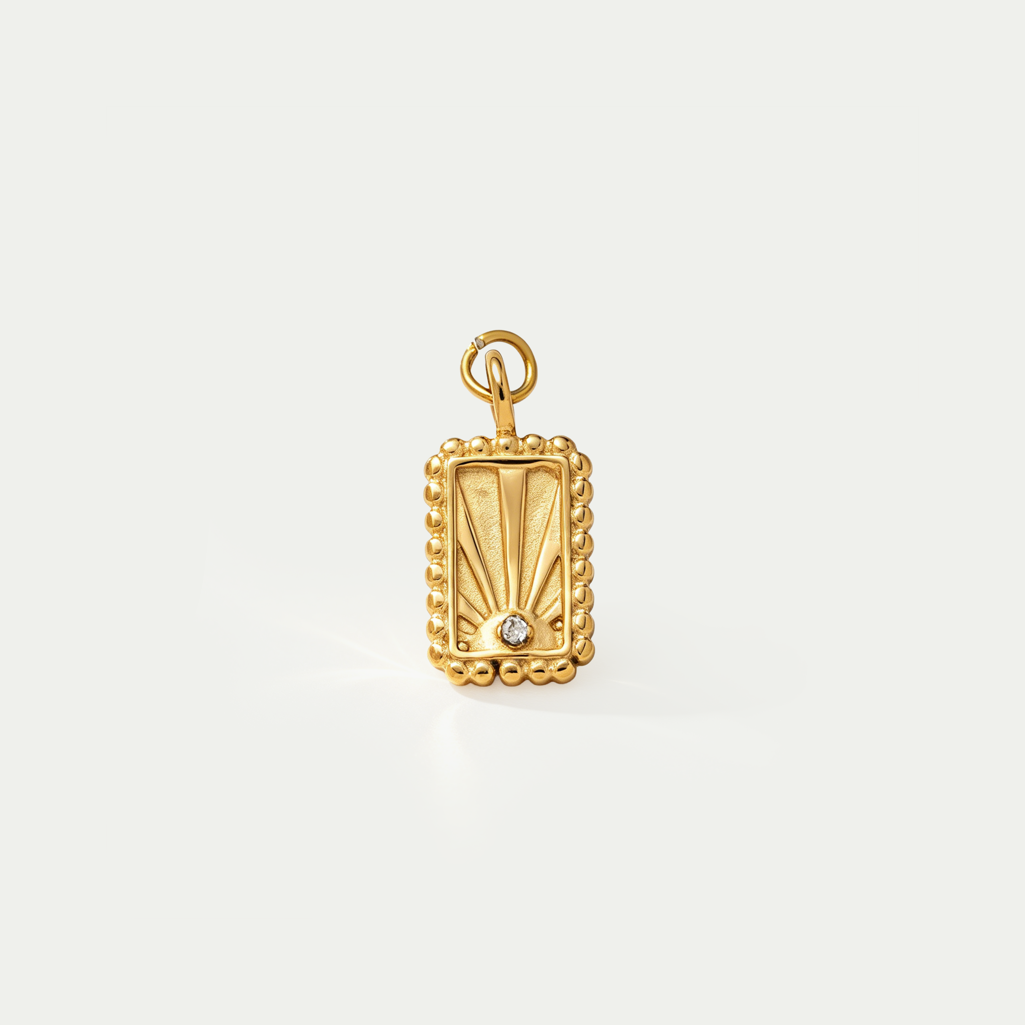 The Solis Sunburst Signet Charm